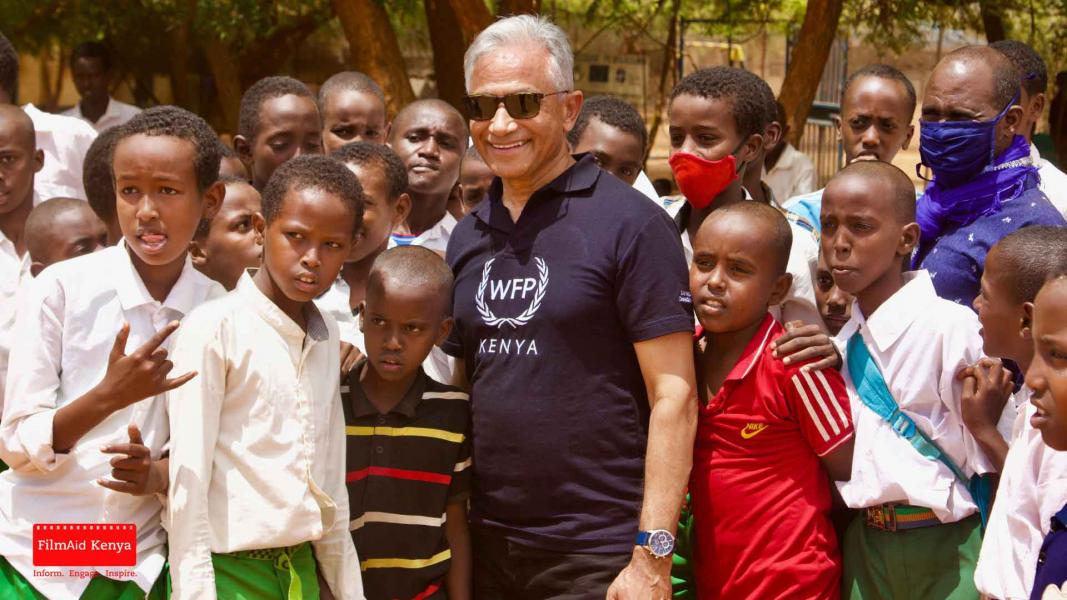 IOAC Chairperson, South Africa, Mr. Suresh Kana, with students at IFO Hormud Primary school. Photo: FilmAid Kenya