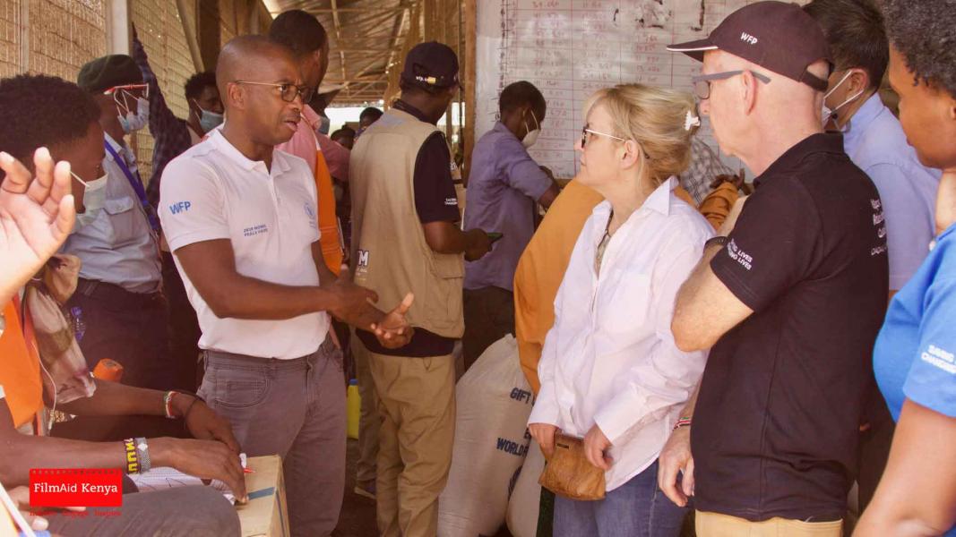 Regional and country office staff discussing food distribution issues. Photo: FilmAid Kenya