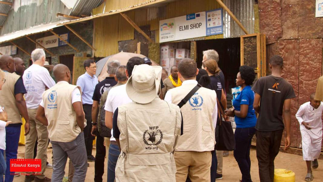 WFP talking to shop owners in the Dadaab refugee camp. Photo: FilmAid Kenya