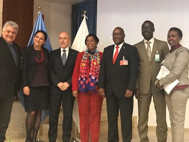 With Minister from Burundi and President of the Board. 