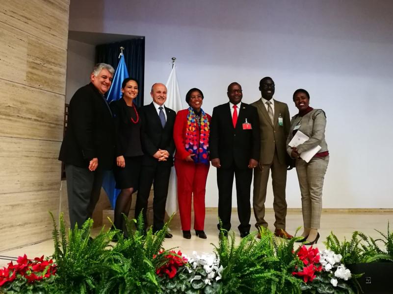 With Minister from Burundi and President of the Board. 