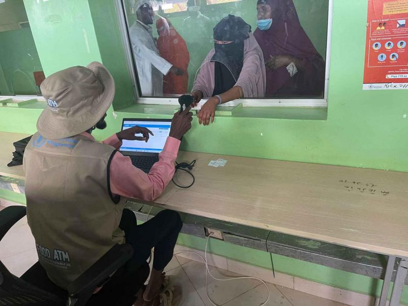 Through electronic cards, known as SCOPE cards, WFP is providing both cash and voucher assistance to people in need, allowing them to choose and buy their own food from local shops across the camp.