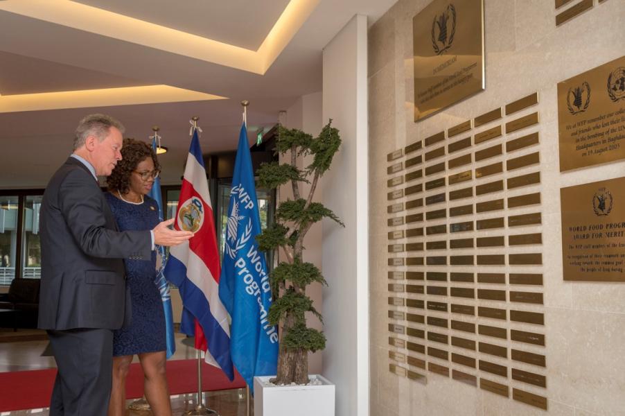 Her Excellency Epsy Campbell Barr, Vice-President of the Republic of Costa Rica, and the Executive Director stops by the Memorial Wall for a moment of reflection. A stop at the Memorial Wall is the first feature PGB includes in high-level visit scenario. Photo Credit: WFP/Giulio dAdamo