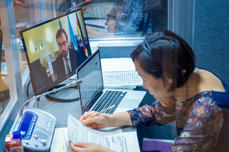 WFP HQ Rome, Italy, 21 June 2021 - In the Photo: interpreter at work during the intervention by Mr. Ramon Lohmar, First Secretary and Alternate Permanent Representative, Germany - (connected remotely). - Photo: WFP/Giulio D'Adamo