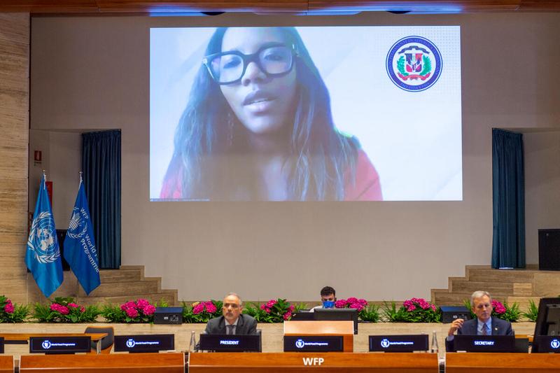 WFP HQ Rome, Italy, 22 June 2021 - In the Photo: intervention by Ms. Berioska Morrison Gonzalez, Dominican Republic - (connected remotely). - H.E. Mr. Luis Fernando Carranza Cifuentes, Guatemala. President of the WFP EB 2021 (left); - Philip Ward, Secretary to the EB (right) - Photo: WFP/Giulio d'Adamo