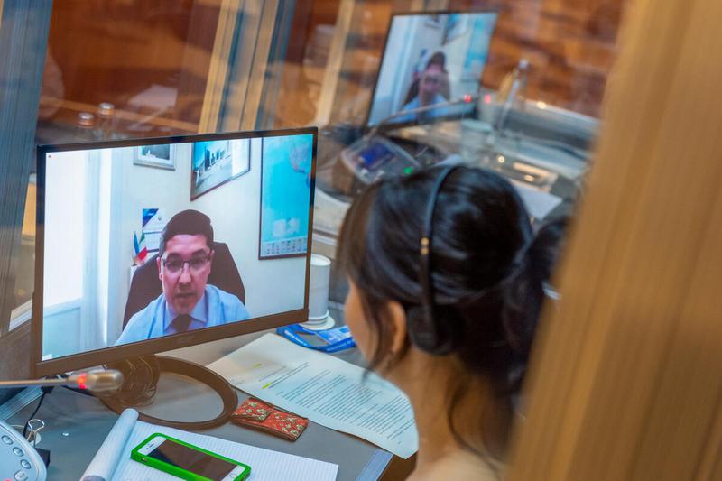 WFP HQ Rome, Italy, 25 June 2021 - In the Photo: interpreter at work during the intervention by H.E. Mr. Nuriddin Kushnazarov, Deputy Permanent Representative ​Uzbekistan - (connected remotely). - Photo: WFP/Giulio D'Adamo
