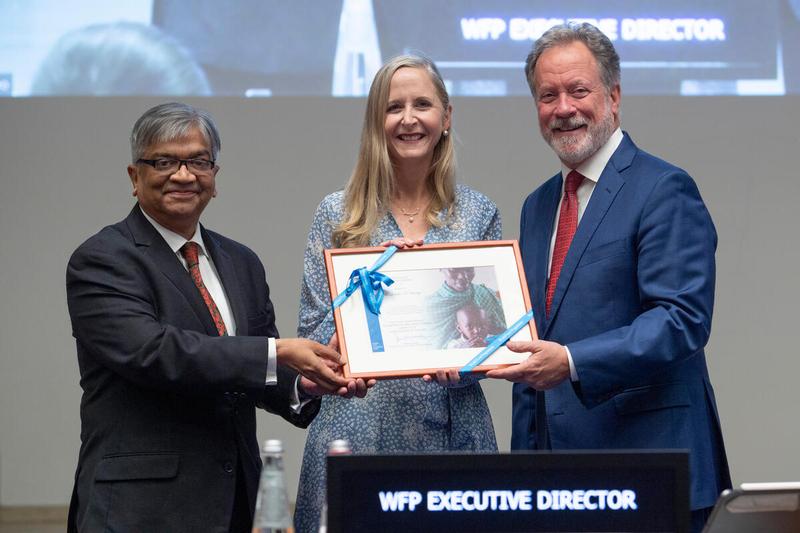 Mr. David Beasley, Executive Director and H.E. Md. Shameem Ahsan Ambassador of the People's Republic of Bangladesh and Executive Board President 2022 present certificates of appreciation to outgoing Ambassadors.  H.E. Ms. Jennifer A. Harhigh - Deputy Chief of Mission United States of America  Photo: Rein Skullerud